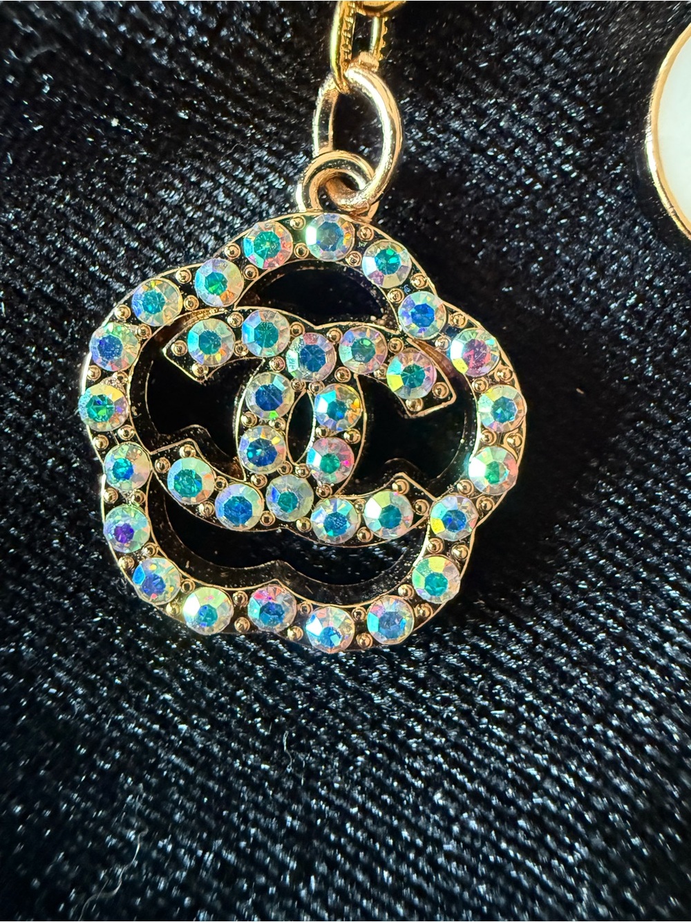 ChaneI Gold-Tone Keyring with White Ribbon and Black Logo and Gold Charms - Picture 5 of 10